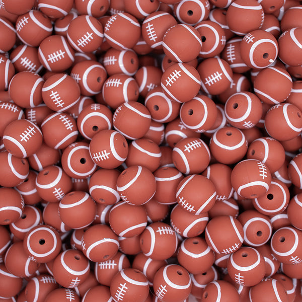 top view of a pile of 15mm Brown Football Silicone Bead