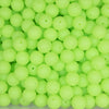 front view of a pile of 15mm Green Glow In The Dark Silicone Bead