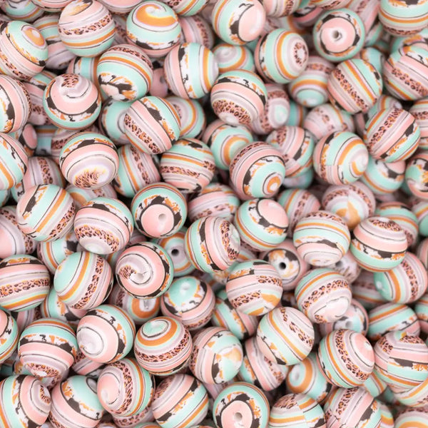 top view of a pile of 15mm Leopard Swirl Silicone Bead