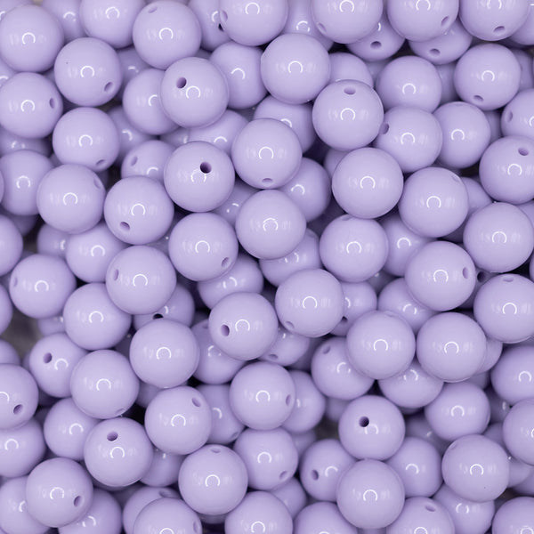 front view of a pile of 15mm Lilac Purple Liquid Style Silicone Bead