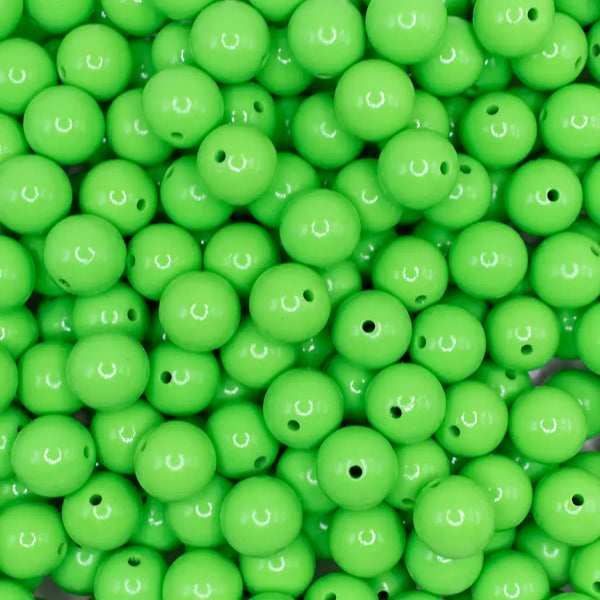 top view of a pile of 15mm Lime Green Liquid Style Silicone Bead