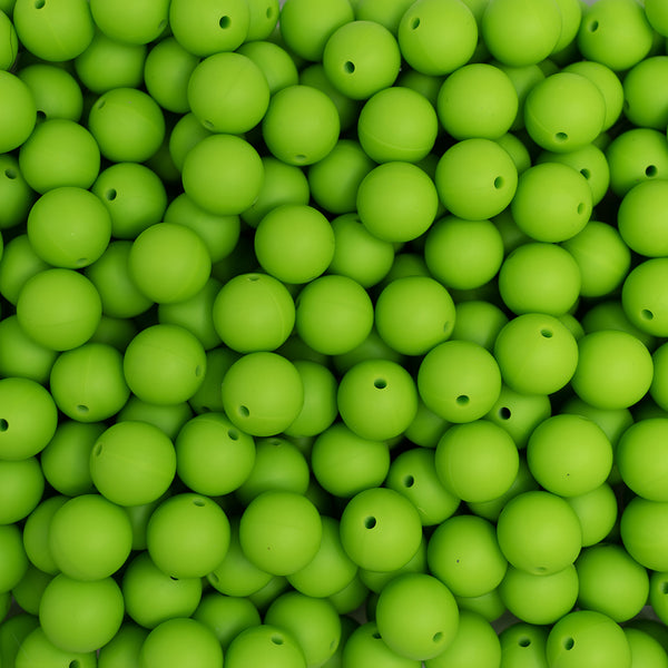 top view of a pile of 15mm Lime Green Round Silicone Bead
