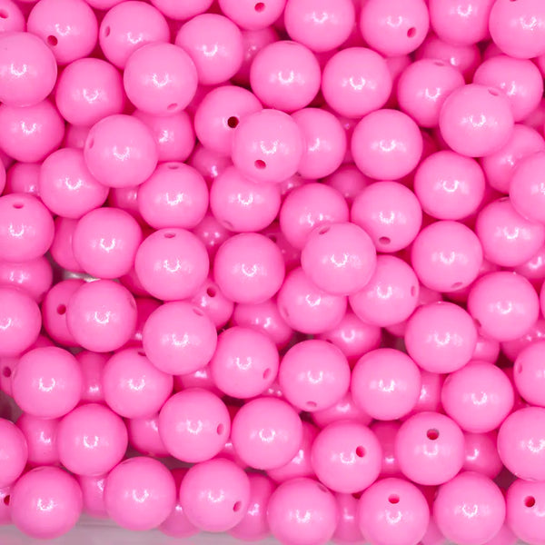 top view of a pile of 15mm Pink Opal Shimmer Round Silicone Bead