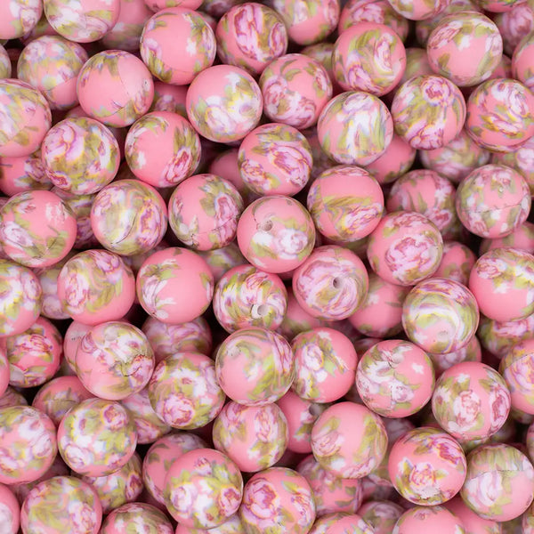 top view of a pile of 15mm Pink with Floral Print Silicone Bead