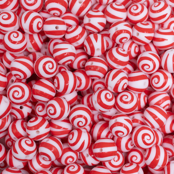 Top view of a pile of 15mm Red Swirl Silicone Bead
