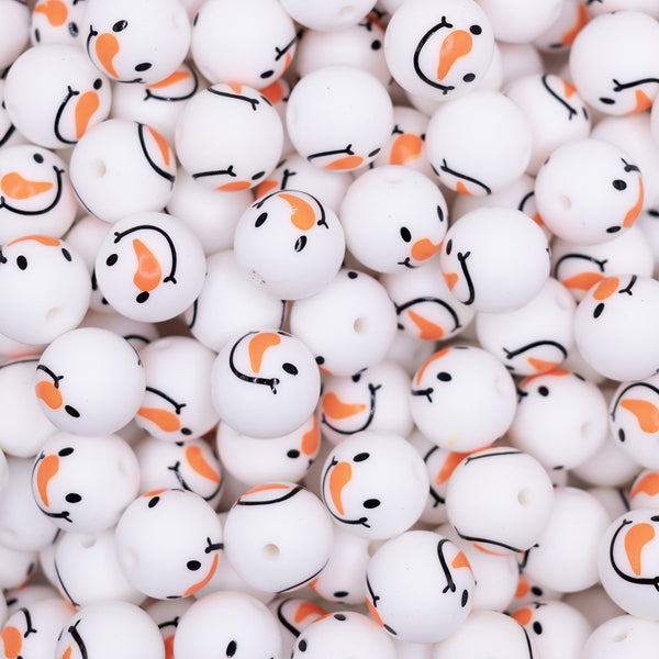 top view of pile of 15mm Snowman Face Print Silicone Bead