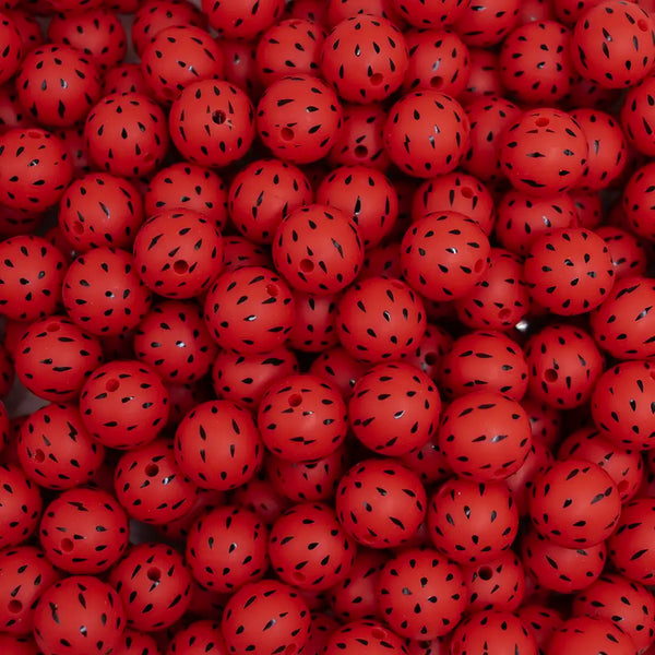 front view of a pile of 15mm Red Watermelon Seed Silicone Bead