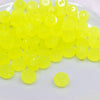 front view of a pile of 12mm Yellow Glow In the Dark Resin Rondelle Spacer Beads - Set of 20