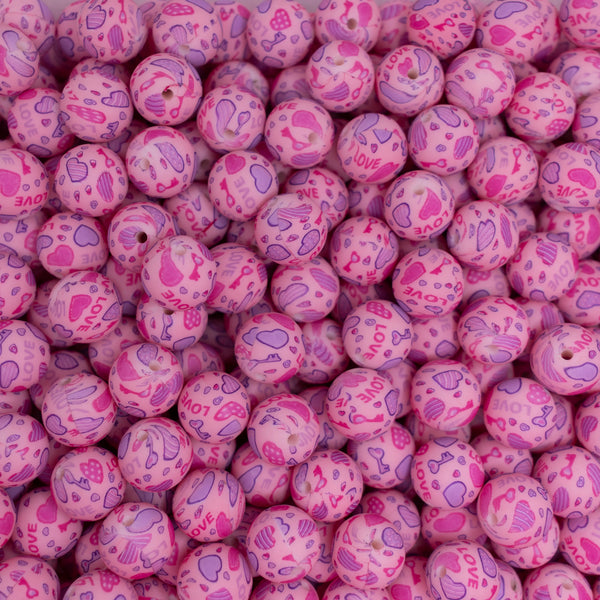 top view of a pile of 15mm Pink Love and Heart Silicone Bead