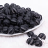 front view of a pile of 16MM Black Frosted Beach Ball Bubblegum Beads