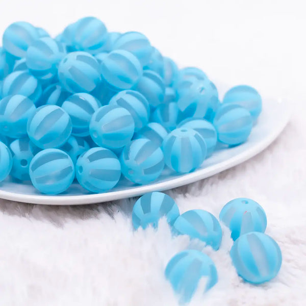 front view of a pile of 16MM Blue Frosted Beach Ball Bubblegum Beads