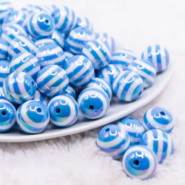 front view of a pile of 16MM Blue with AB Stripes Bubblegum Beads