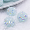 close up view of a pile of 16mm Blue Snowflake luxury acrylic beads