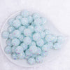 top view of a pile of 16mm Blue Snowflake luxury acrylic beads
