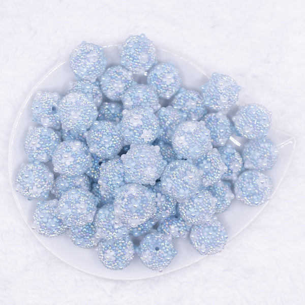 top view of a pile of 16mm Blue with Pearls luxury acrylic beads