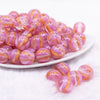 front view of a pile of 16mm Bright Pink Cats Eye Acrylic Bubblegum Beads