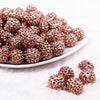 front view of a pile of 16mm Copper Rhinestone Bubblegum Beads