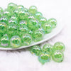 front view of a pile of 16mm Green Crackle AB Bubblegum Beads