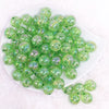 top view of a pile of 16mm Green Crackle AB Bubblegum Beads