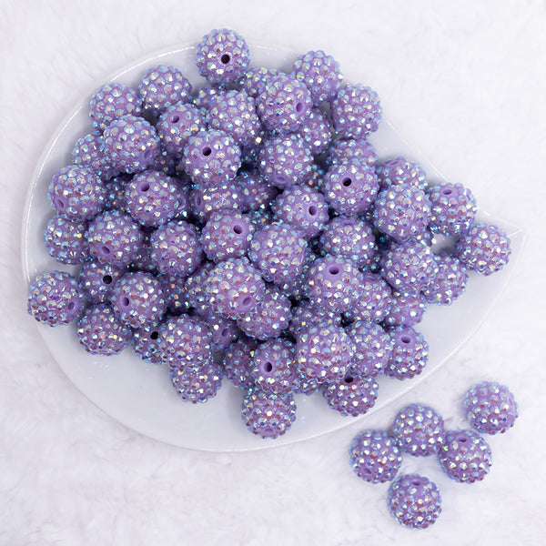 top view of a pile of 16mm Iris Purple Rhinestone AB Bubblegum Beads