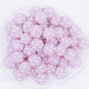 top view of a pile of 16mm Light Purple with pearls luxury acrylic beads