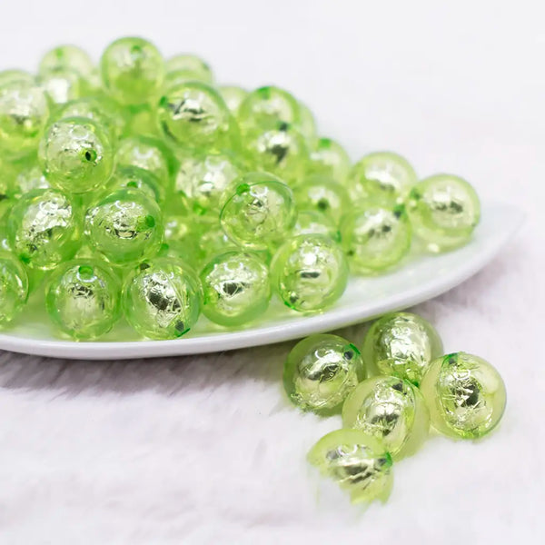 front view of a pile of 16mm Lime Green Foil Bubblegum Beads