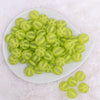 top view of a pile of 16MM Lime Green Frosted Beach Ball Bubblegum Beads