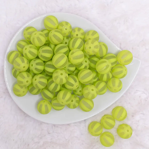 top view of a pile of 16MM Lime Green Frosted Beach Ball Bubblegum Beads