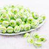 front view of a pile of 16MM Lime Green with AB Stripes Bubblegum Beads