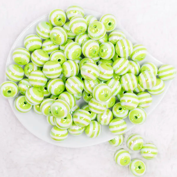 top view of a pile of 16MM Lime Green with AB Stripes Bubblegum Beads