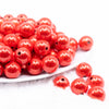 front view of a pile of 16mm Orange Miracle Bubblegum Bead