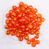 top view of a pile of 16mm Orange Foil Bubblegum Beads