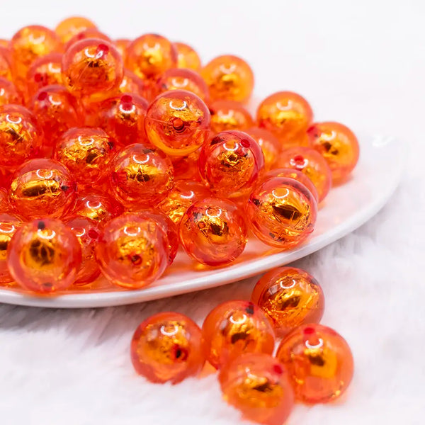 front view of a pile of 16mm Orange Foil Bubblegum Beads