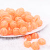 front view of a pile of 16MM Orange Frosted Beach Ball Bubblegum Beads