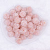 top view of a pile of 16mm Peach with Pearls luxury acrylic beads
