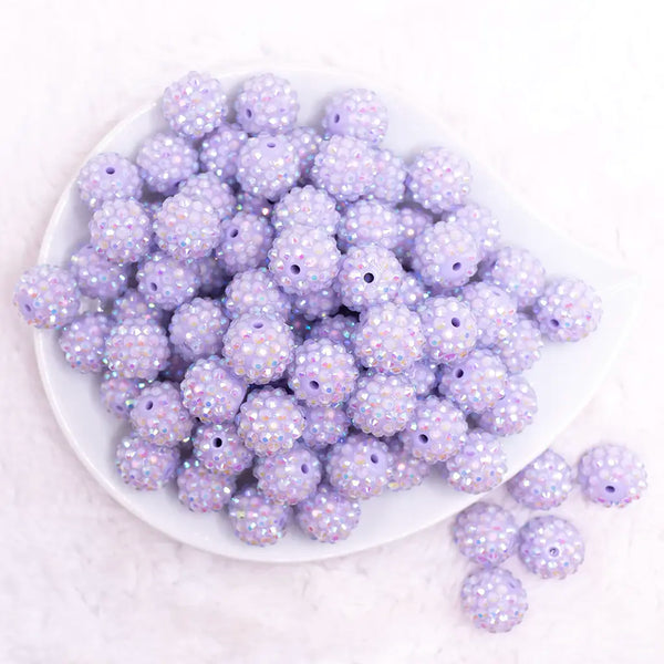 top view of a pile of 16mm Pastel Purple Rhinestone AB Bubblegum Beads