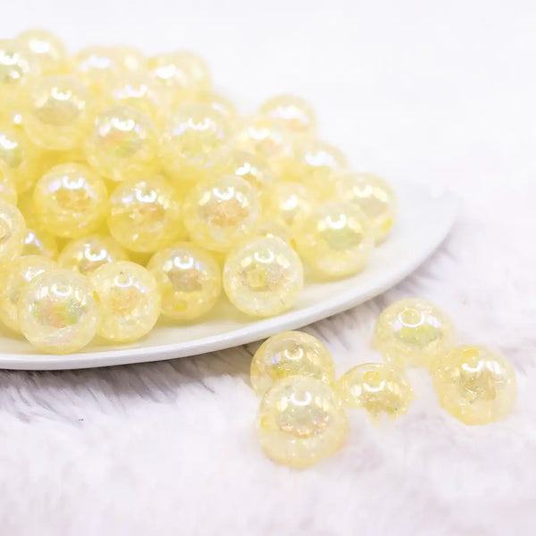 front view of a pile of 16mm Pastel Yellow Crackle AB Bubblegum Beads