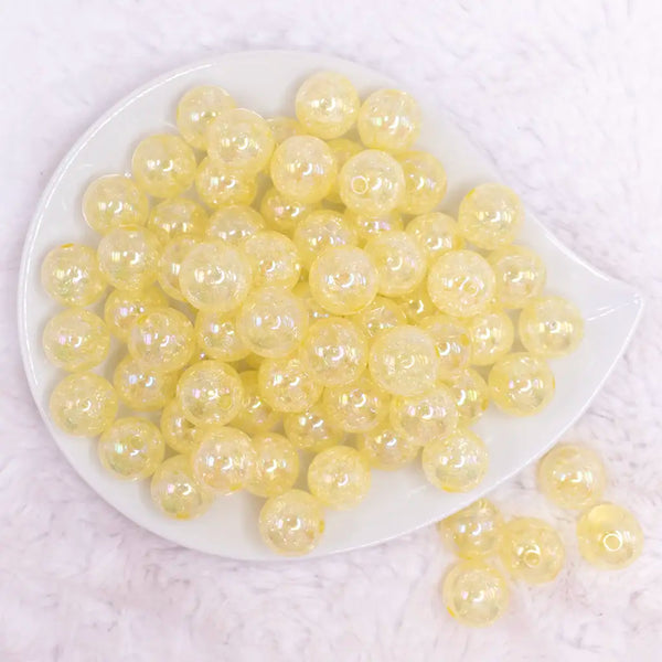 top view of a pile of 16mm Pastel Yellow Crackle AB Bubblegum Beads