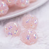 close up view of a pile of 16mm Pink Snowflake luxury acrylic beads