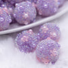 close up view of a pile of 16mm Purple with Pearls luxury acrylic beads