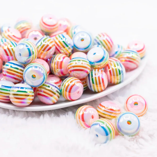 front view of a pile of 16MM Rainbow with AB Stripes Bubblegum Beads