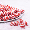 front view of a pile of 16mm Red and White Beach Ball Bubblegum Beads