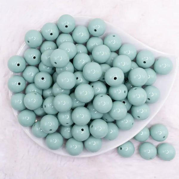 top view of a pile of 16mm Robin Blue Solid Bubblegum Beads