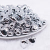 front view of a pile of 18mm Silver Chrome Heart Acrylic Bubblegum Beads