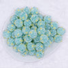 top view of a pile of 16mm Teal Blue with Pearls luxury acrylic beads
