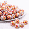 front view of a pile of 16mm Happy Thanksgiving Print Bubblegum Bead