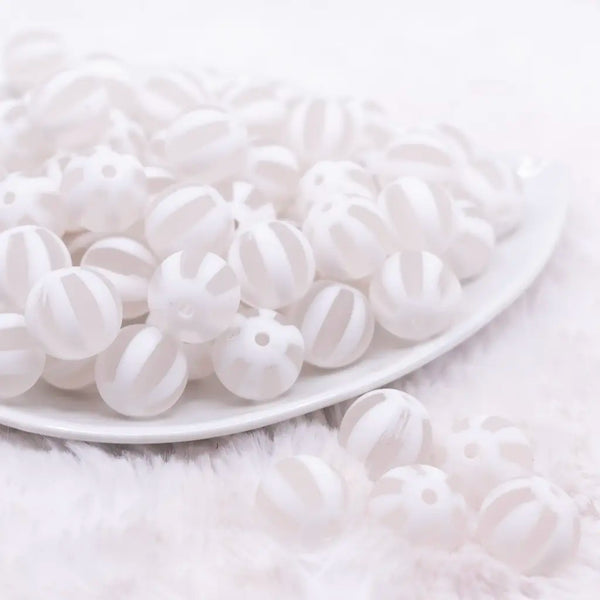 front view of a pile of 16MM White Frosted Beach Ball Bubblegum Beads