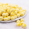 front view of a pile of 16MM Yellow with AB Stripes Bubblegum Beads