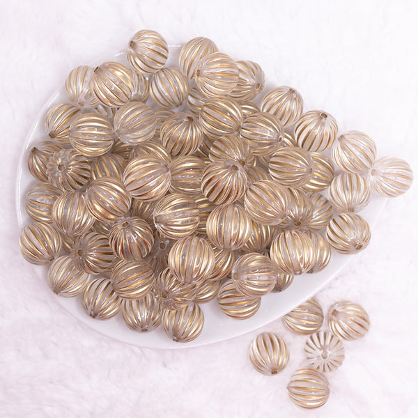 top view of a pile of 16mm Gold antique Bubblegum Beads