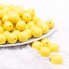 front view of a pile of 16mm Yellow Solid Bubblegum Beads